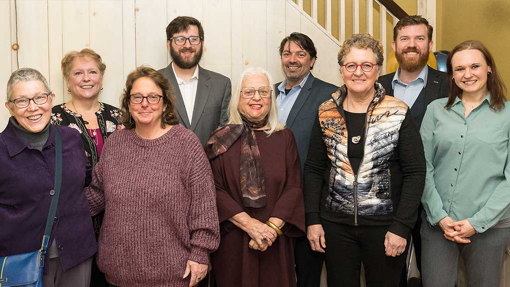 A photo of Board members, staff and volunteers